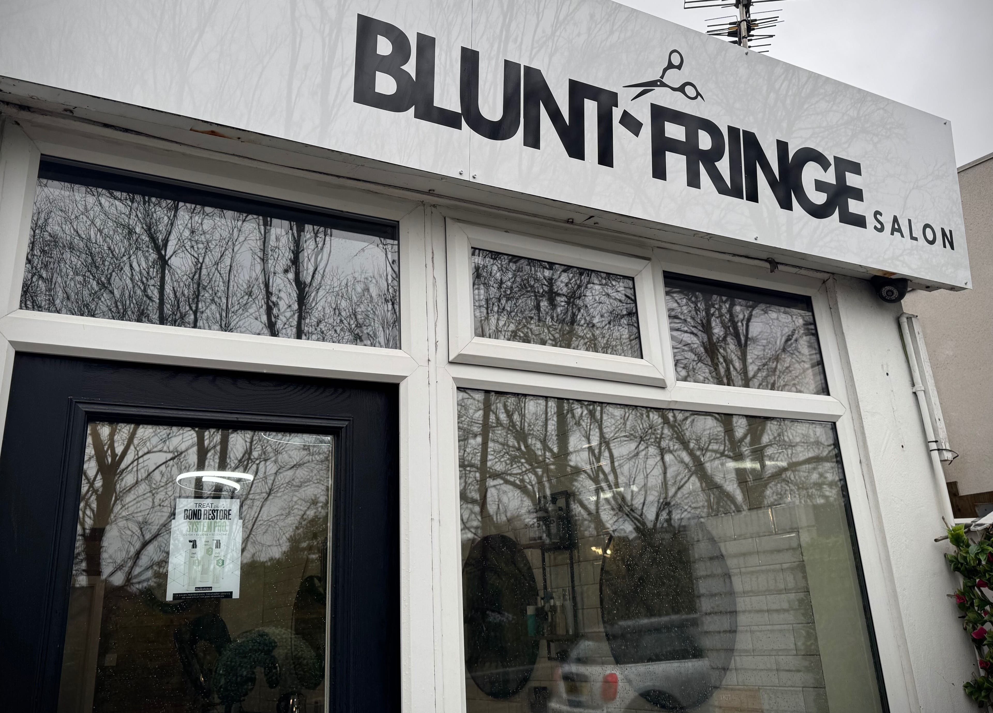 Entrance of Christopher at BLUNT FRINGE Salon in Rowley Regis, England, GB, showcasing modern design.