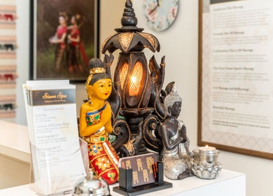 Decorative statues and a lantern at Siam Spa - Therapeutic Massage & Wellness Morningside, Morningside, Queensland, AU.