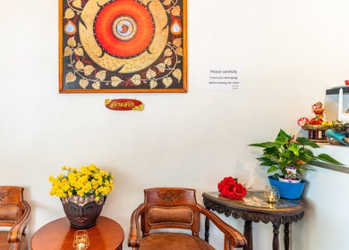 Relaxing decor at Siam Spa - Therapeutic Massage & Wellness Morningside, Queensland, AU showing chairs and artwork.