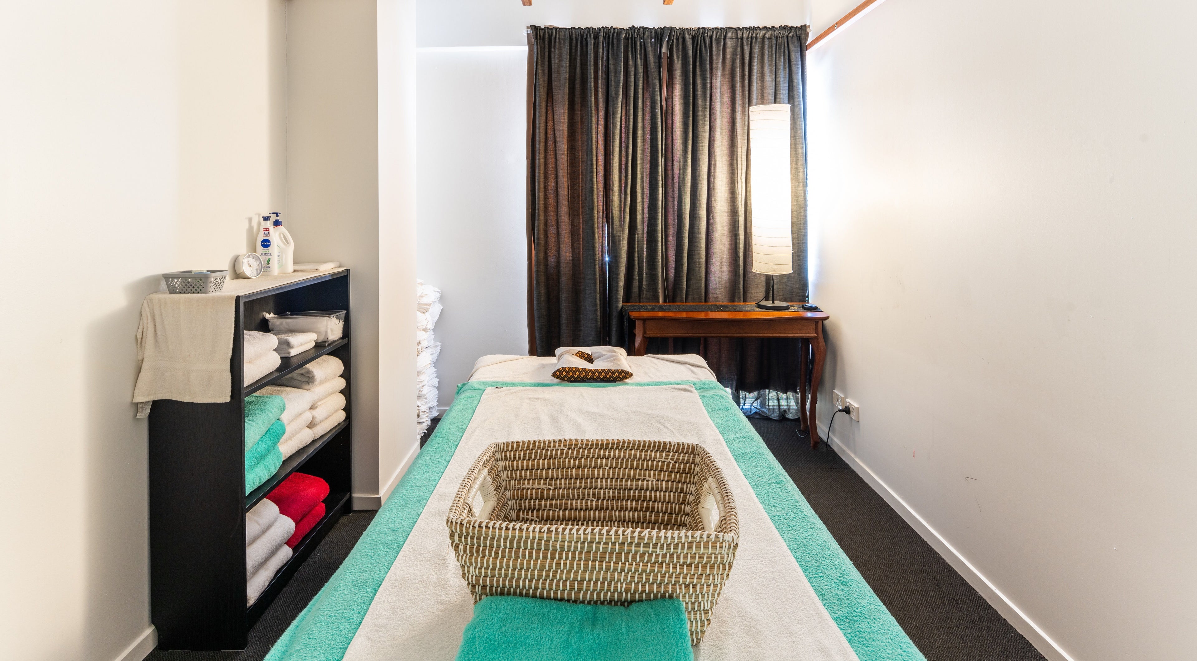 Tranquil massage room at Siam Spa - Therapeutic Massage & Wellness Morningside, Queensland, AU with cozy setup.