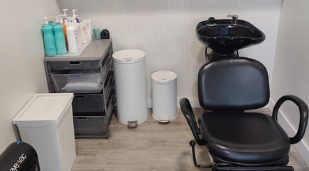 Professional styling chair at Sage Kids Family Salon & Piercing Boutique in West Linn, Oregon, US.