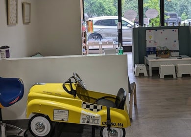 Fun kids' play area and seating at Sage Kids Family Salon & Piercing Boutique, West Linn, Oregon, US.