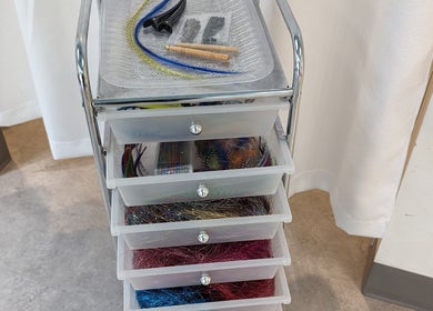 Hair styling tools and vibrant accessories at Sage Kids Family Salon & Piercing Boutique, West Linn, Oregon, US.