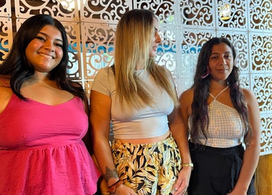 Three women smiling at CG Bella Extensions, St Thelmo by Abrazos hotel, San Pedro, BZ.