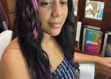 Woman with pink hair highlights at CG Bella Extensions, St Thelmo by Abrazos hotel, San Pedro, BZ.