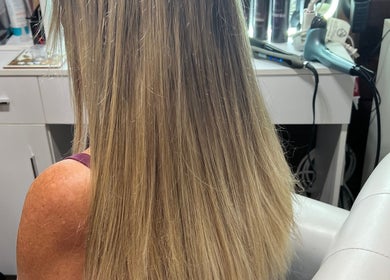 Blonde hair styled at CG Bella Extensions, St Thelmo by Abrazos hotel, San Pedro, BZ.