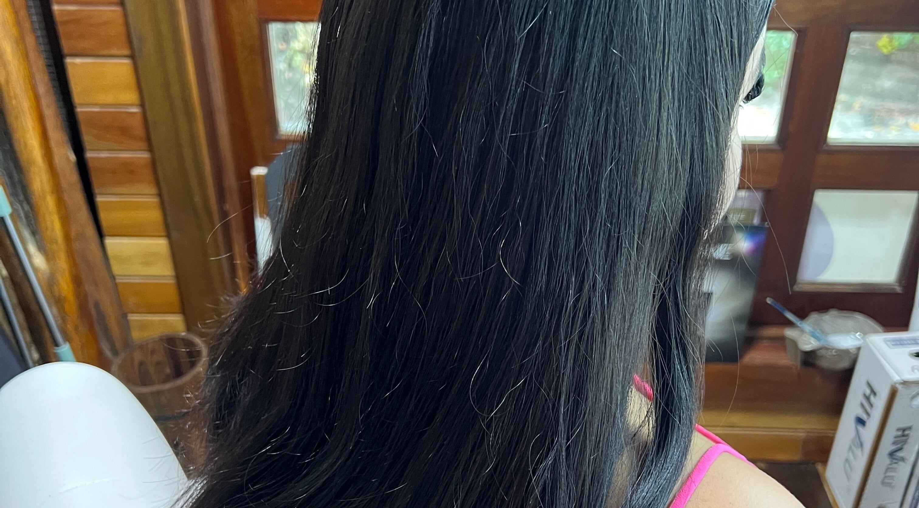 Long black hair styled at CG Bella Extensions in St Thelmo by Abrazos hotel, San Pedro, BZ.