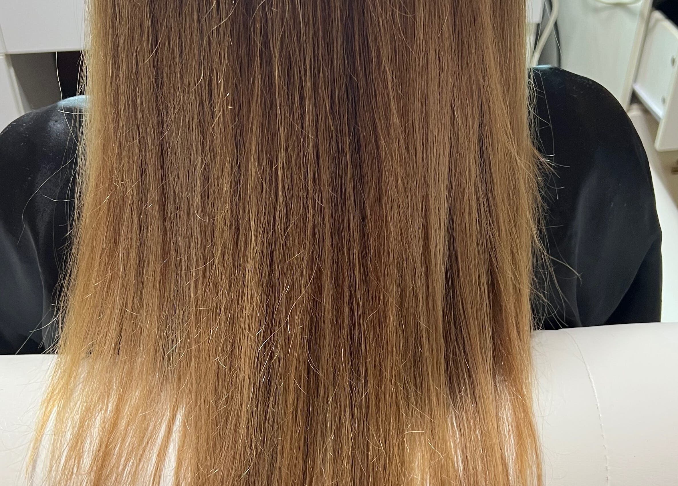 Smooth blonde hair styled at CG Bella Extensions, St Thelmo by Abrazos hotel, San Pedro, BZ.