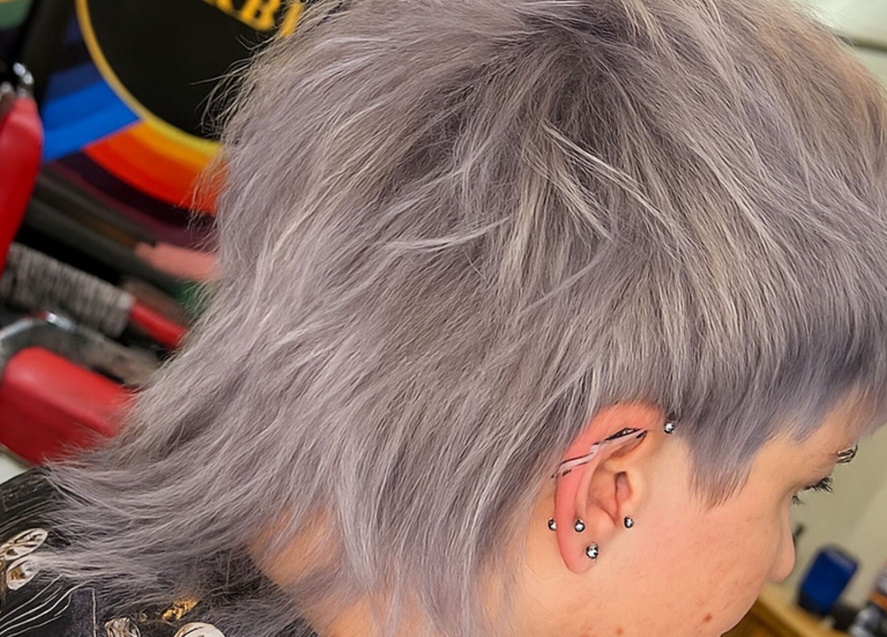 Trendy silver hairstyle showcased at Yo Barbra in Bacchus Marsh, Victoria, AU, highlighting modern hair design.