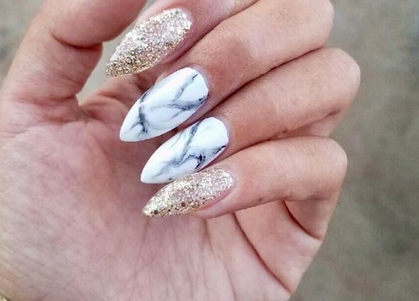 Elegant marble and glitter nail art at Nail Luxe, Davie, Florida, US. Perfect blend of style and sophistication.