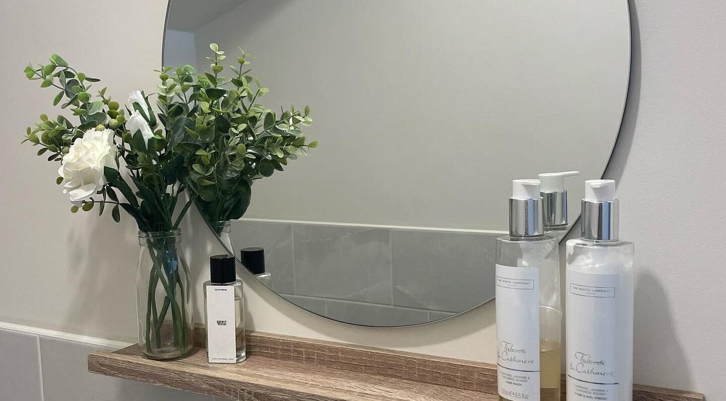 Elegant vanity with greenery and skincare at Abigail Grace Beauty, Rugby, England, GB enhancing ambiance.