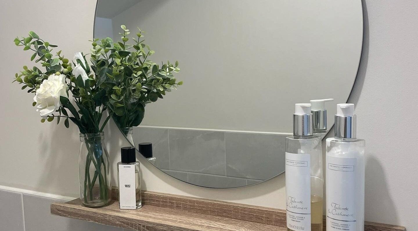Elegant vanity with greenery and skincare at Abigail Grace Beauty, Rugby, England, GB enhancing ambiance.