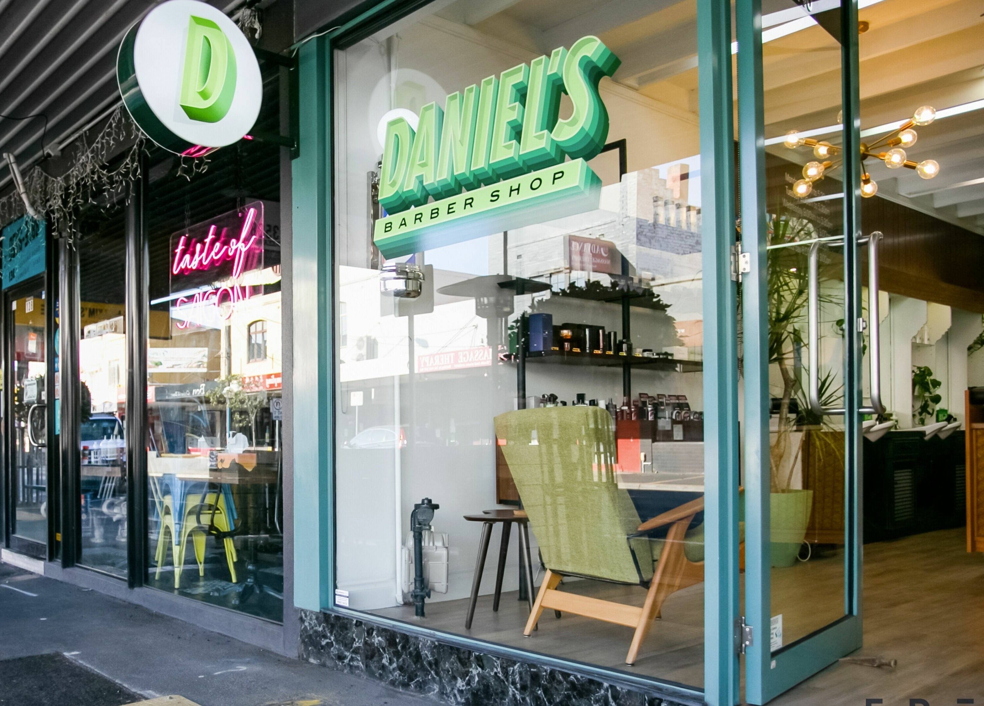 Front view of Daniel’s Barbershop in Melbourne, Victoria, AU, showcasing stylish interior and welcoming entrance.