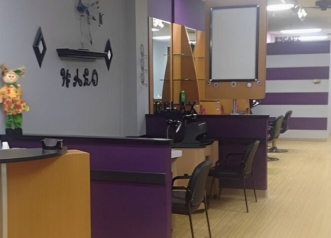 Interior view of Halo Salon And Medi Spa in Scranton, Pennsylvania, US featuring purple and wood decor.