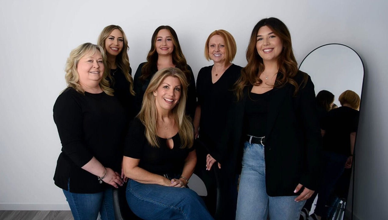 Team at Salon 102 & Spa, West Greenwich, Rhode Island, US, showcasing friendly service and expertise.