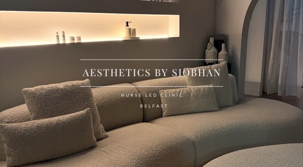 Cozy lounge at Aesthetics by Siobhan, Belfast, Northern Ireland with plush seating and ambient lighting.