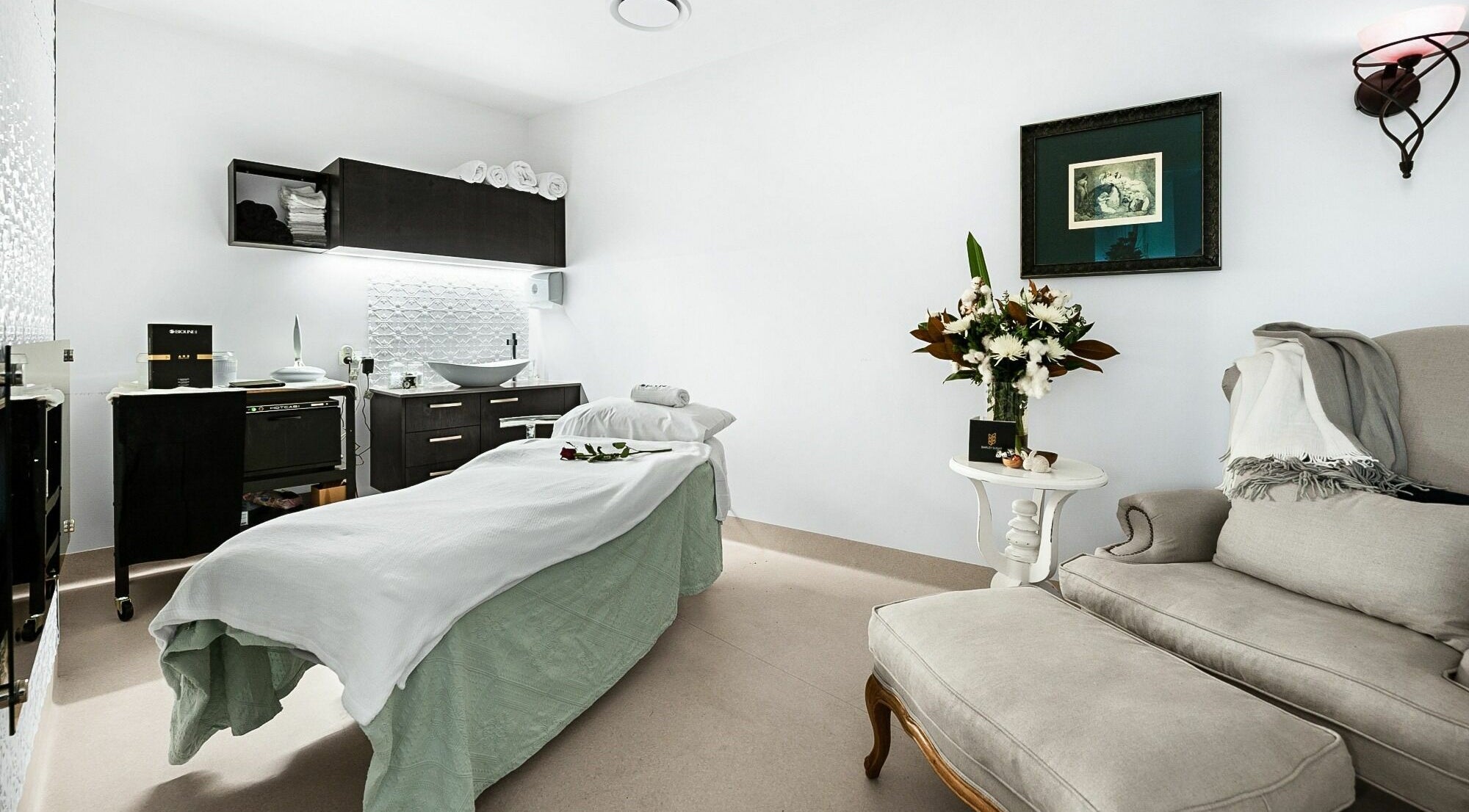 Relaxing spa room at Barley Sugar Day Spa and Beauty, Salamander Bay, New South Wales, AU, with massage table.