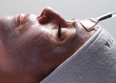 Facial treatment at Ease Esthetics & Massage in Tulsa, Oklahoma, US showcasing skincare luxury.