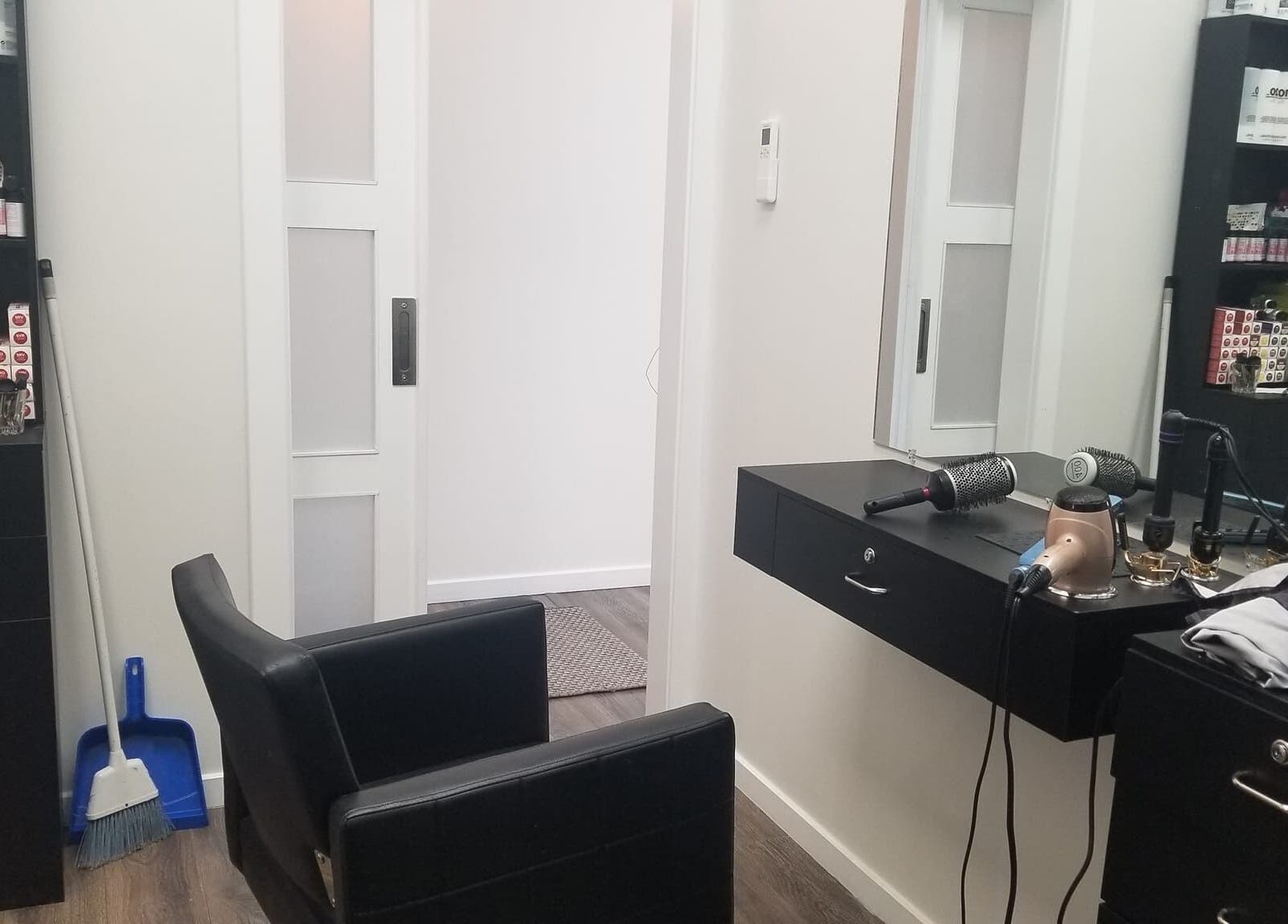 Modern salon setup at Seaside at Salon Suites by the Sea in Rockport, Maine, US featuring hair tools and products.