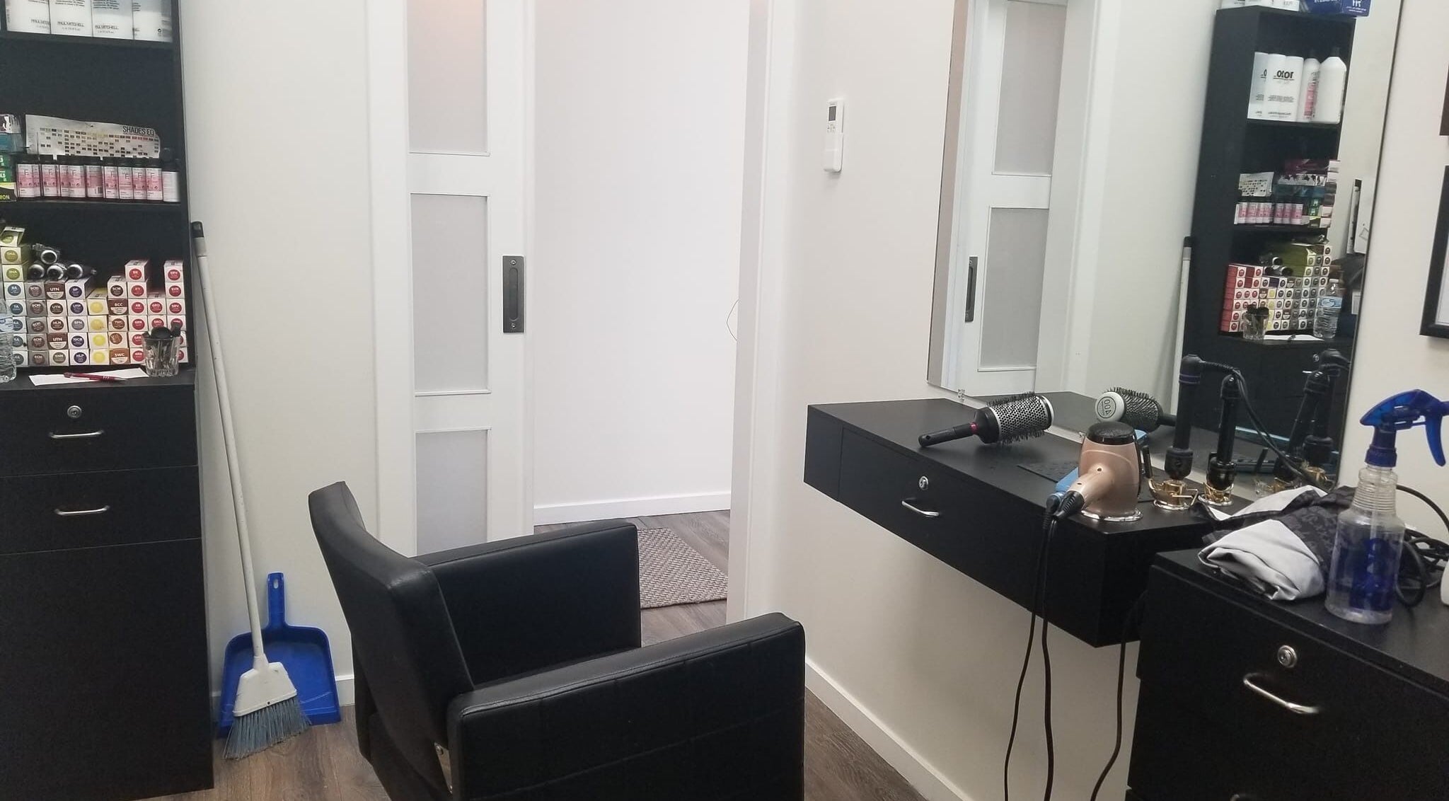 Modern salon setup at Seaside at Salon Suites by the Sea in Rockport, Maine, US featuring hair tools and products.