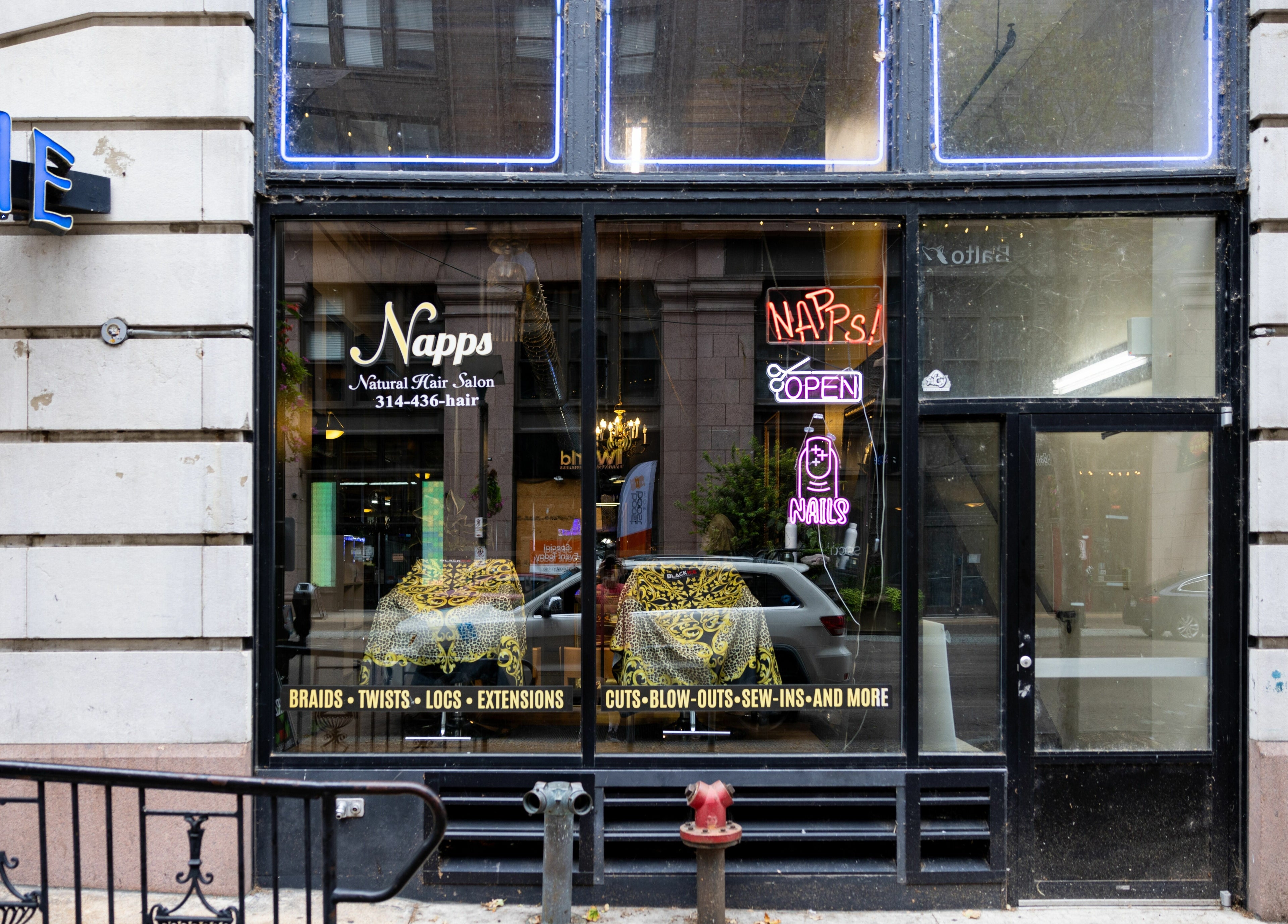 Front view of Napps Natural Hair Salon, St. Louis, Missouri, US showcasing chic window design.