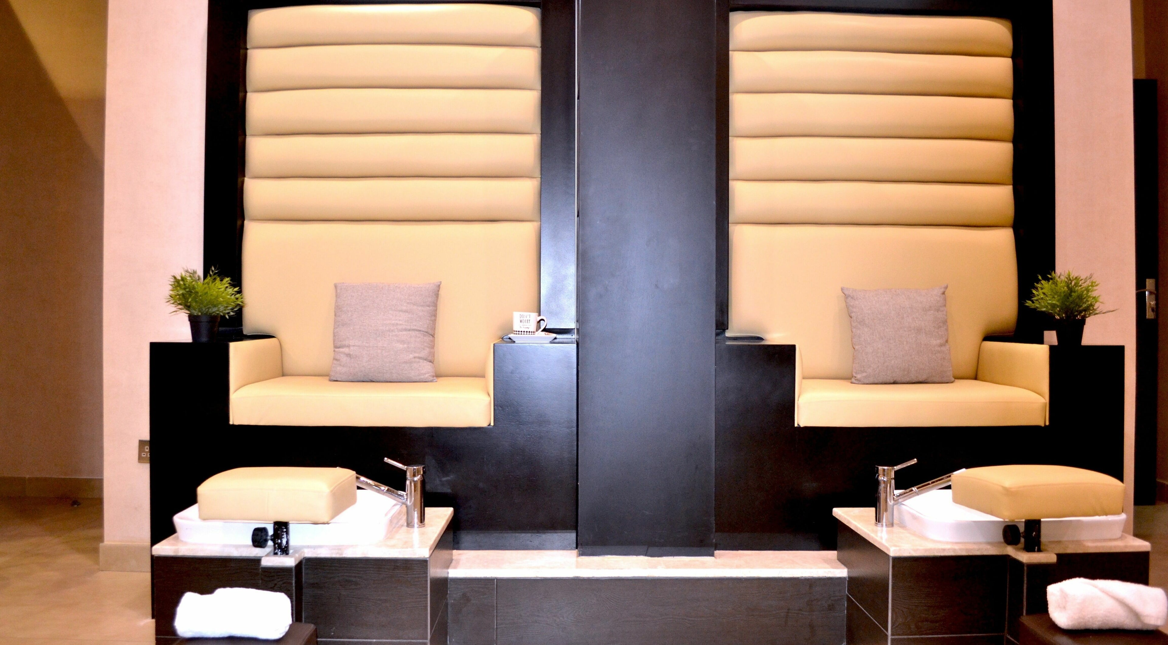 Luxurious pedicure station at Beauty Garden in Dubai, Dubai, AE showcasing plush seating and spa amenities.