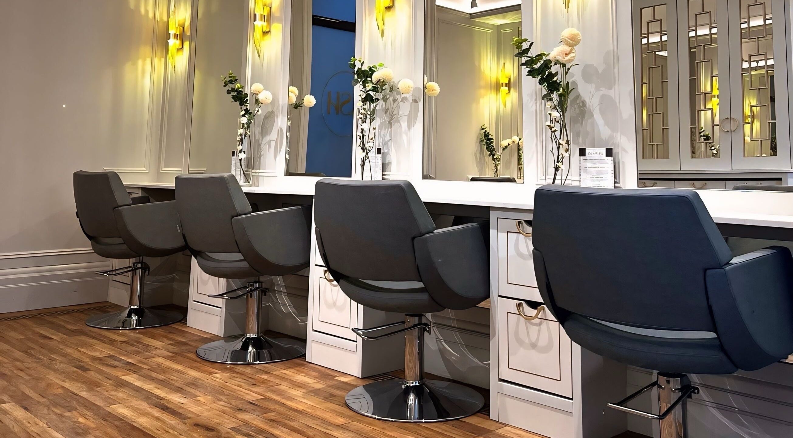 Stylish salon chairs at ASH Hair Specialists, Skipton, England, GB, offering luxury haircare services.