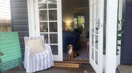 Rebecca Orchard Remedial Massage entrance with cozy seating in Hamilton, New South Wales, AU.