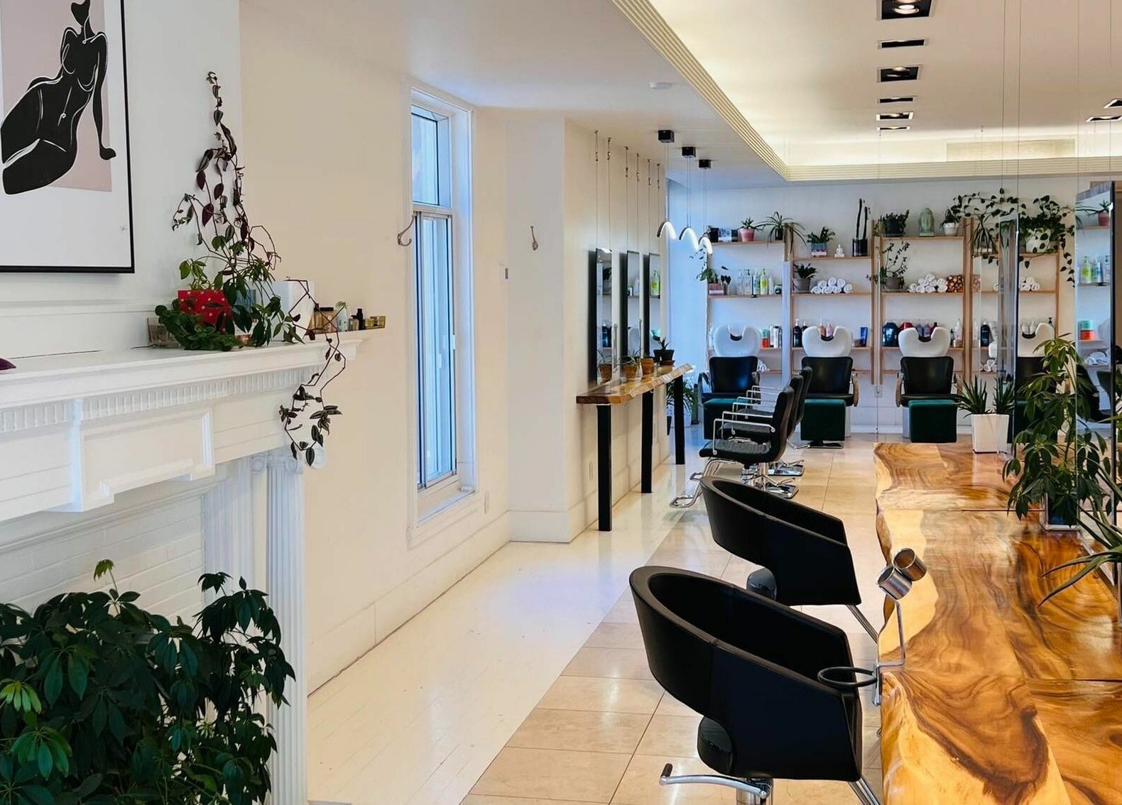 Chic interior of Nu Salon with modern styling stations in Montréal, Québec, CA.