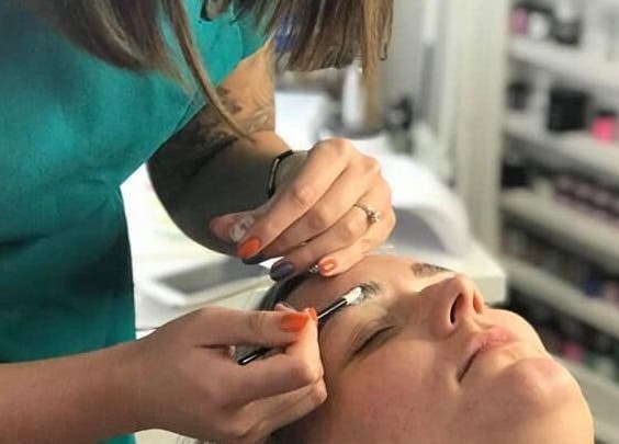 Expert brow treatment at Tips 2 Toes Boutique in Wall Heath, England, GB, enhancing client beauty and relaxation.