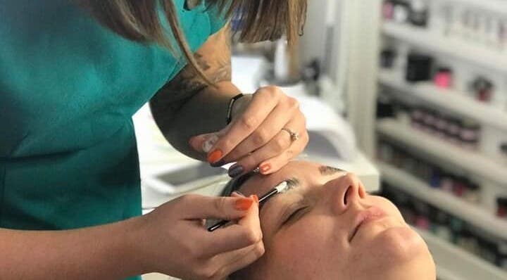 Expert brow treatment at Tips 2 Toes Boutique in Wall Heath, England, GB, enhancing client beauty and relaxation.