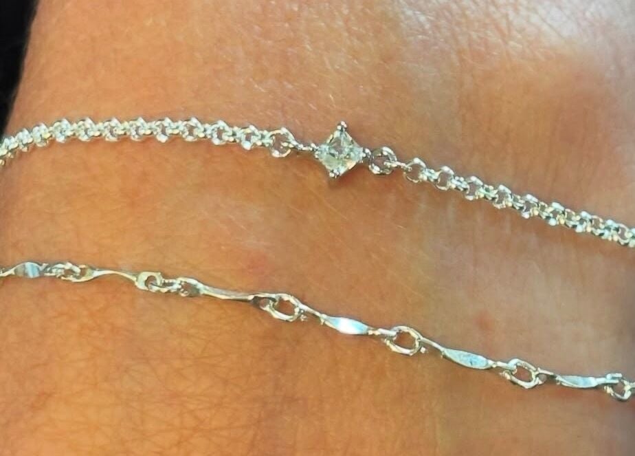 Delicate chain bracelets from Allure Nails, Beauty & Permanent Jewellery in Stoke-on-Trent, England, GB.