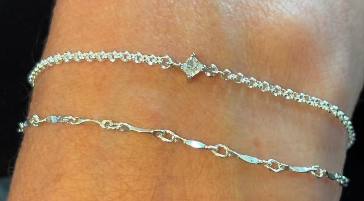 Delicate chain bracelets from Allure Nails, Beauty & Permanent Jewellery in Stoke-on-Trent, England, GB.