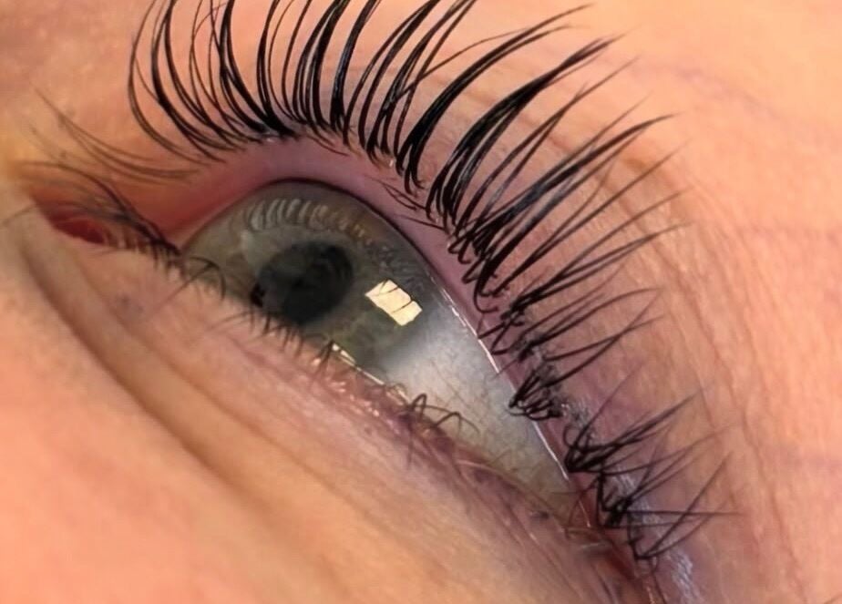 Close-up of beautifully enhanced eyelashes at Allure Nails, Beauty & Permanent Jewellery, Stoke-on-Trent, England, GB.