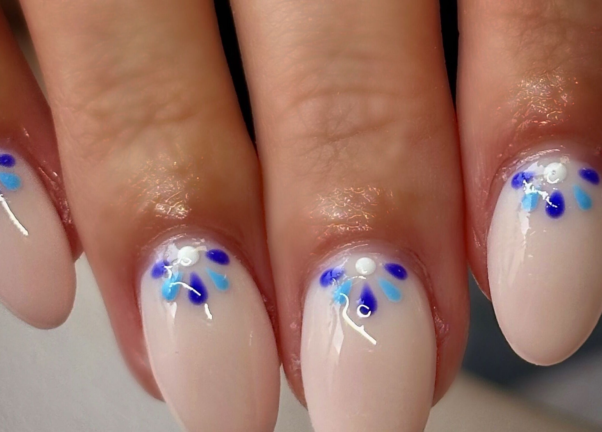 Elegant floral nail art at Allure Nails, Beauty & Permanent Jewellery, Stoke-on-Trent, England, GB.