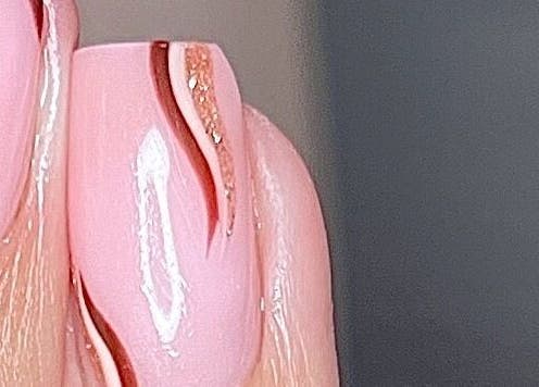 Elegant pink nails with sleek designs at Allure Nails, Beauty & Permanent Jewellery, Stoke-on-Trent, England, GB.