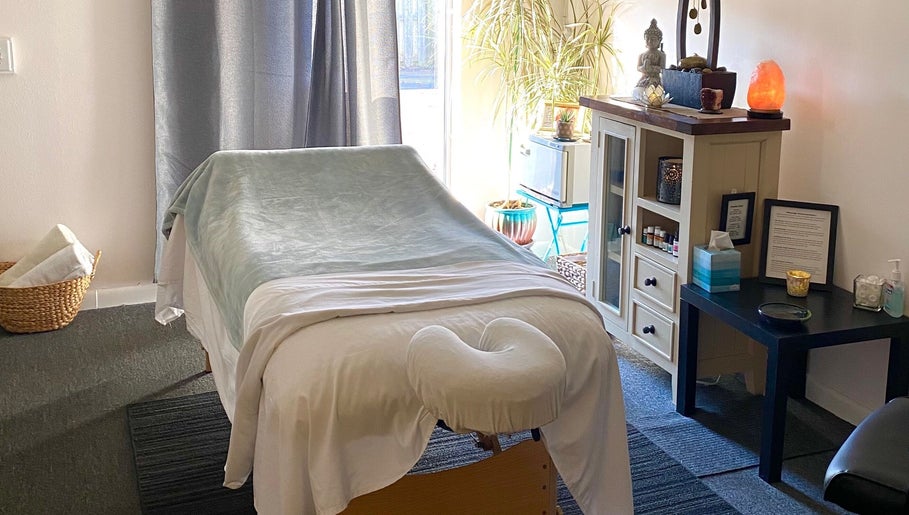 Peaceful massage room at Caroline Altmann Massage Therapy in St. Augustine, Florida, US, with calming decor.