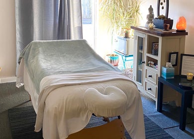 Peaceful massage room at Caroline Altmann Massage Therapy in St. Augustine, Florida, US, with calming decor.