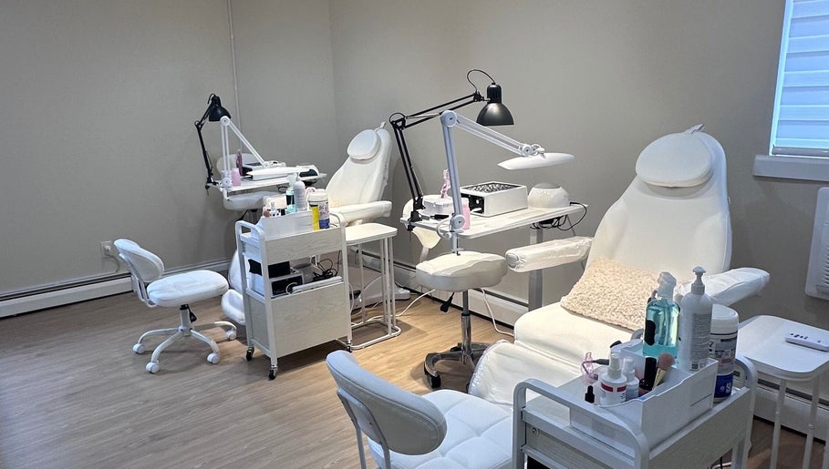 Lilynailsmater Carle Place venue in Carle Place, New York, US features modern nail and beauty chairs and tools.