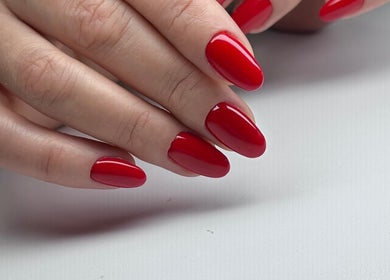 Stunning red manicured nails at Lilynailsmater Carle Place, Carle Place, New York, US.