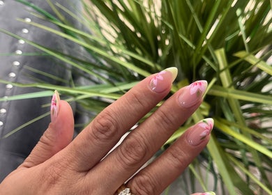 Floral nail art at Lilynailsmaster Forest Hills, New York, New York, US, showcasing vibrant design.