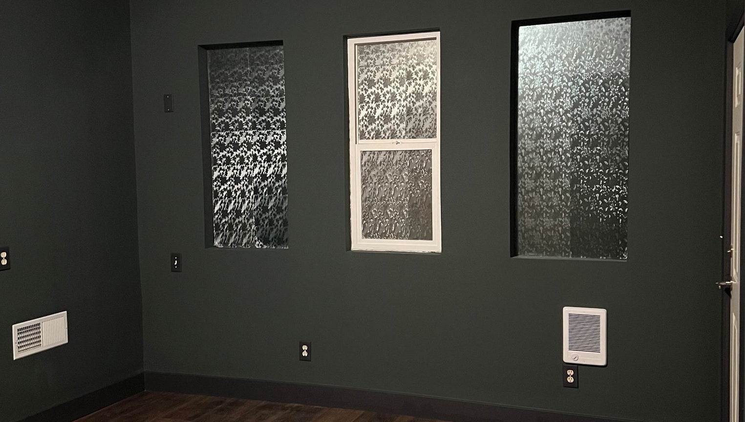 Decorative glass windows in Elfin Spa Fairy, Orem, Utah, US create a serene atmosphere.