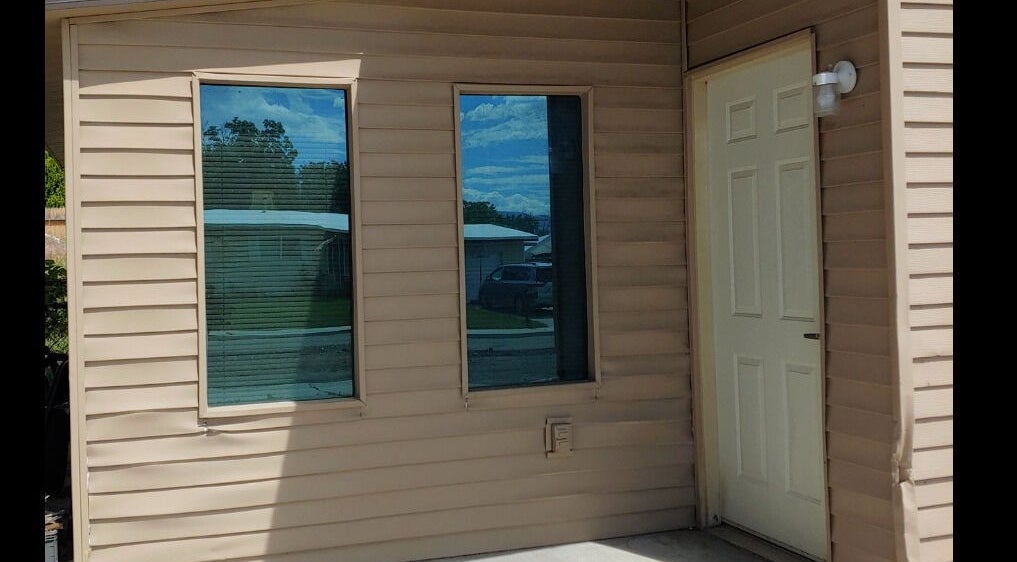 Exterior entrance of Elfin Spa Fairy in Orem, Utah, US with sunny reflections.
