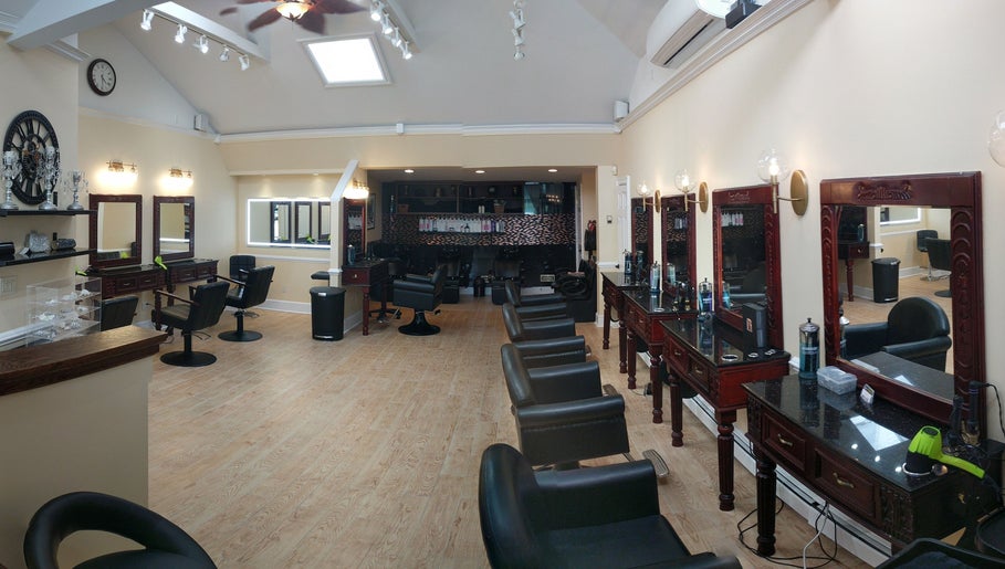 Elegant interior of Salon Posh & DeCara Makeup, Mamaroneck, New York, US featuring stylish salon chairs and mirrors.