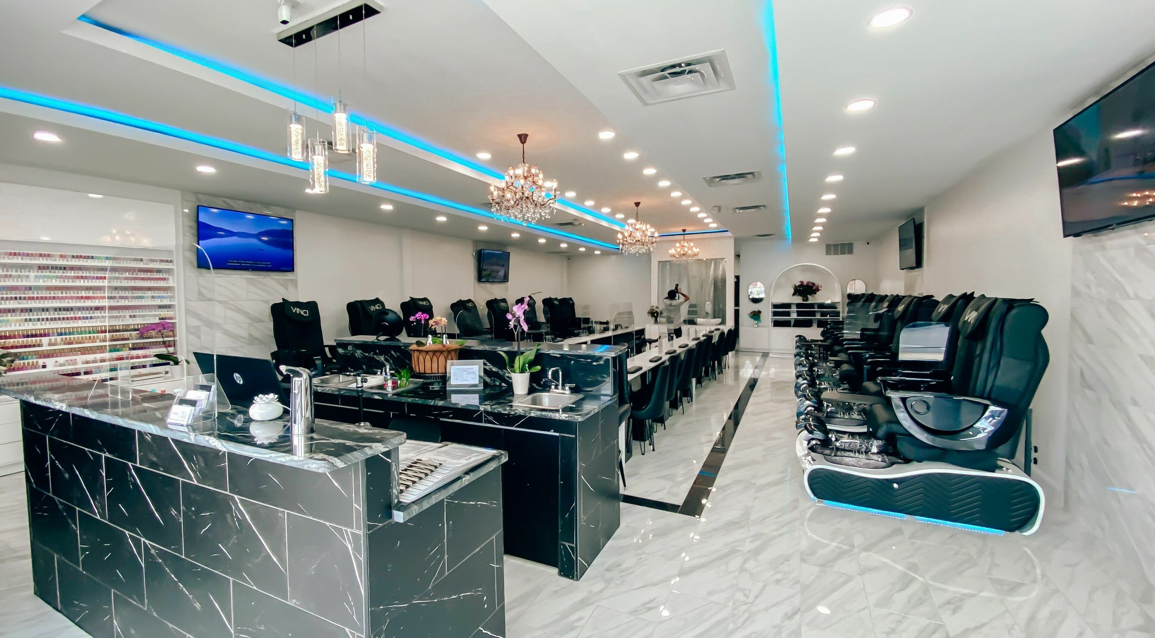 Interior of Vinci Nail Lounge at Italian Village, Columbus, Ohio, US showcasing luxury spa chairs and polished decor.