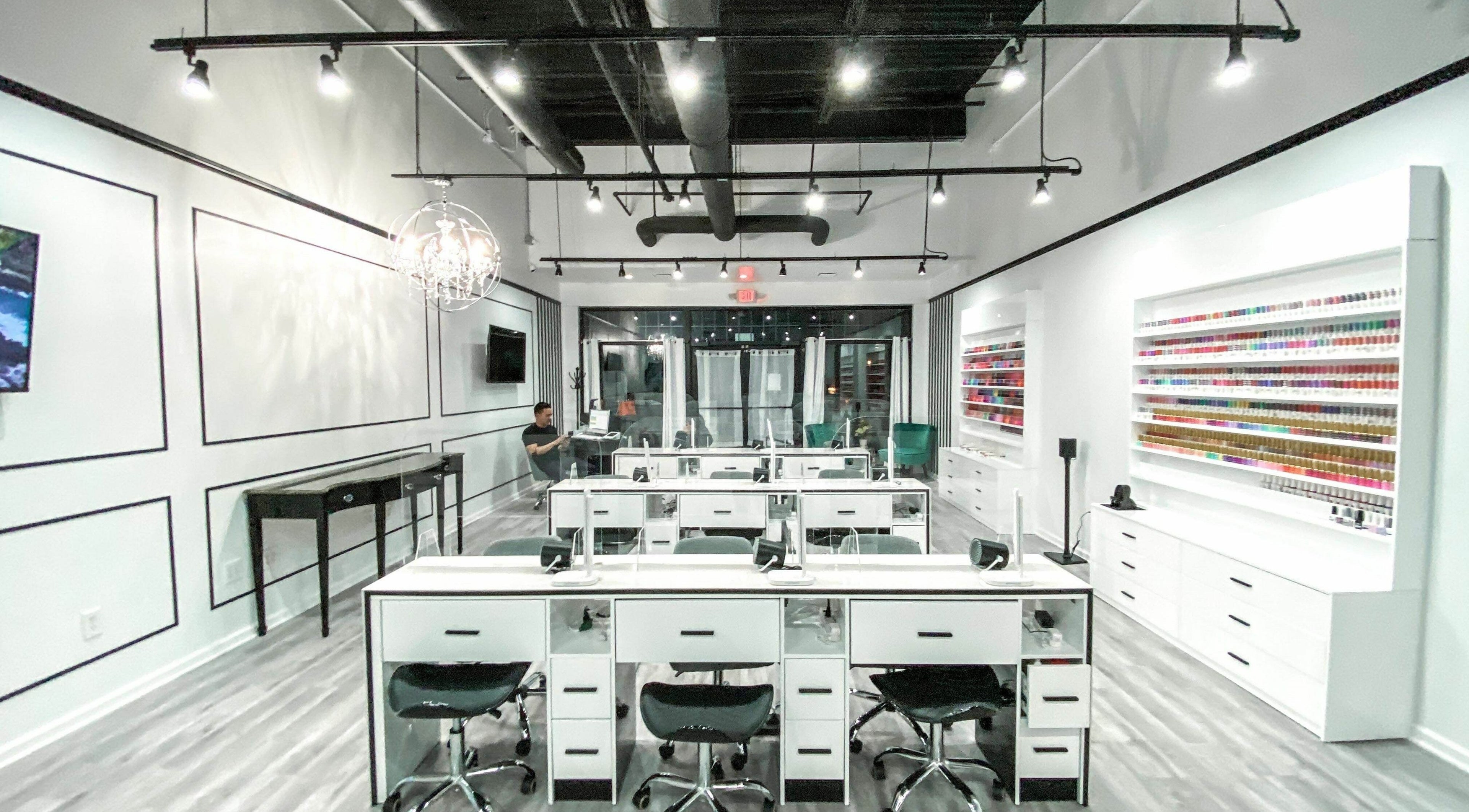 Interior view of Magnolia Nail Salon in Westerville, Ohio, US, featuring modern design and organized polish display.