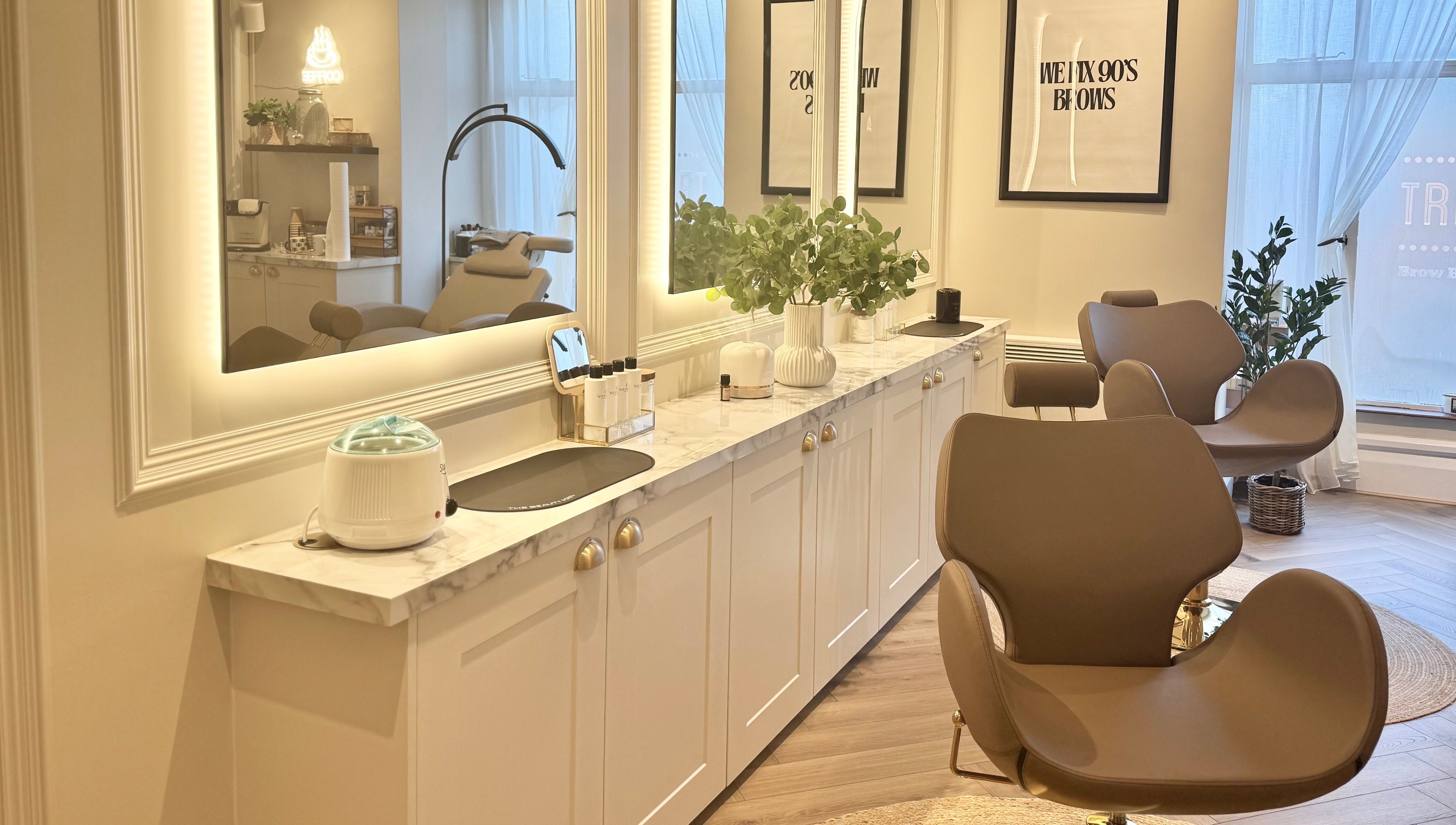 Trends Brow Bar in Hoddesdon, England, offers a relaxing beauty experience in a chic, modern setting.