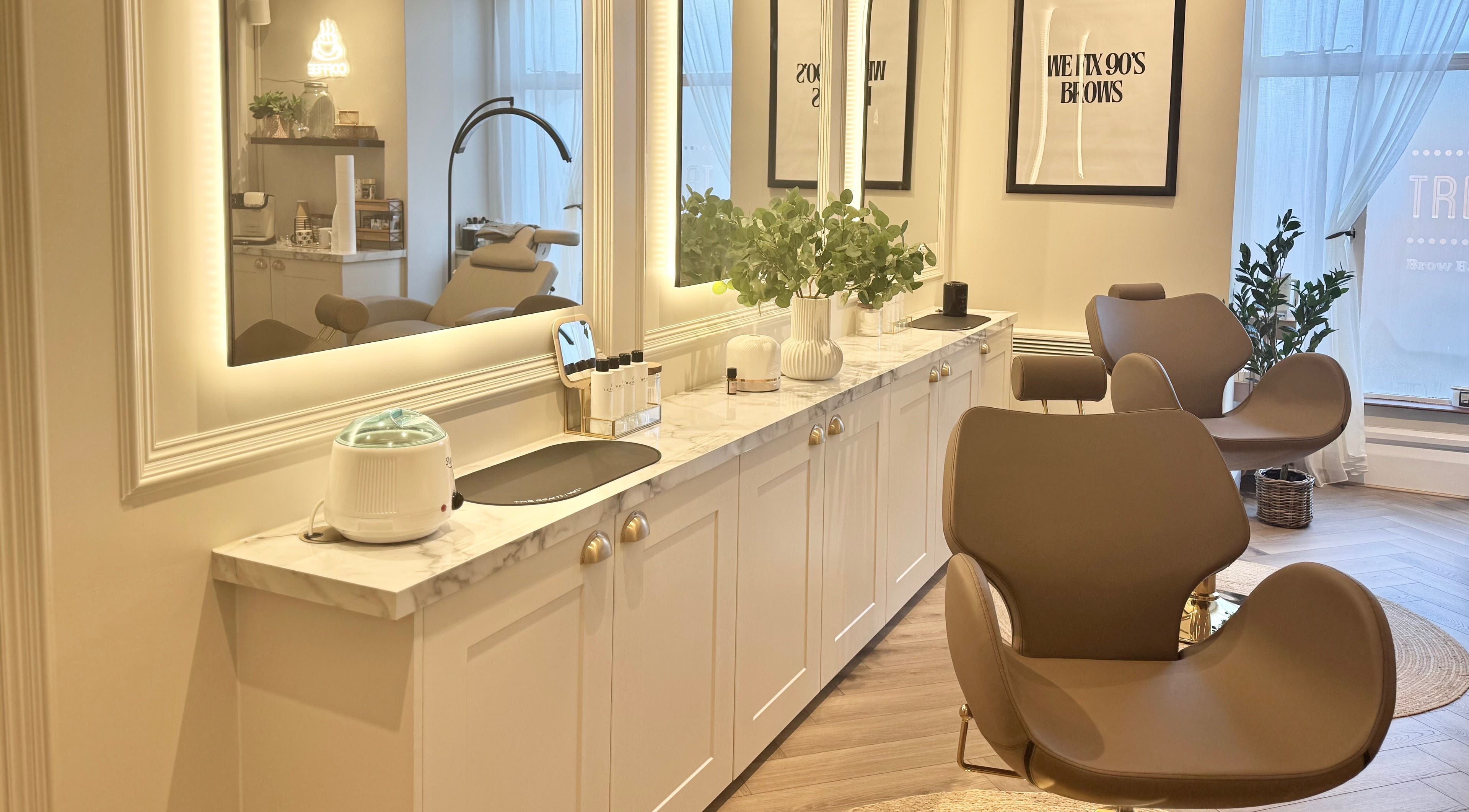 Trends Brow Bar in Hoddesdon, England, offers a relaxing beauty experience in a chic, modern setting.