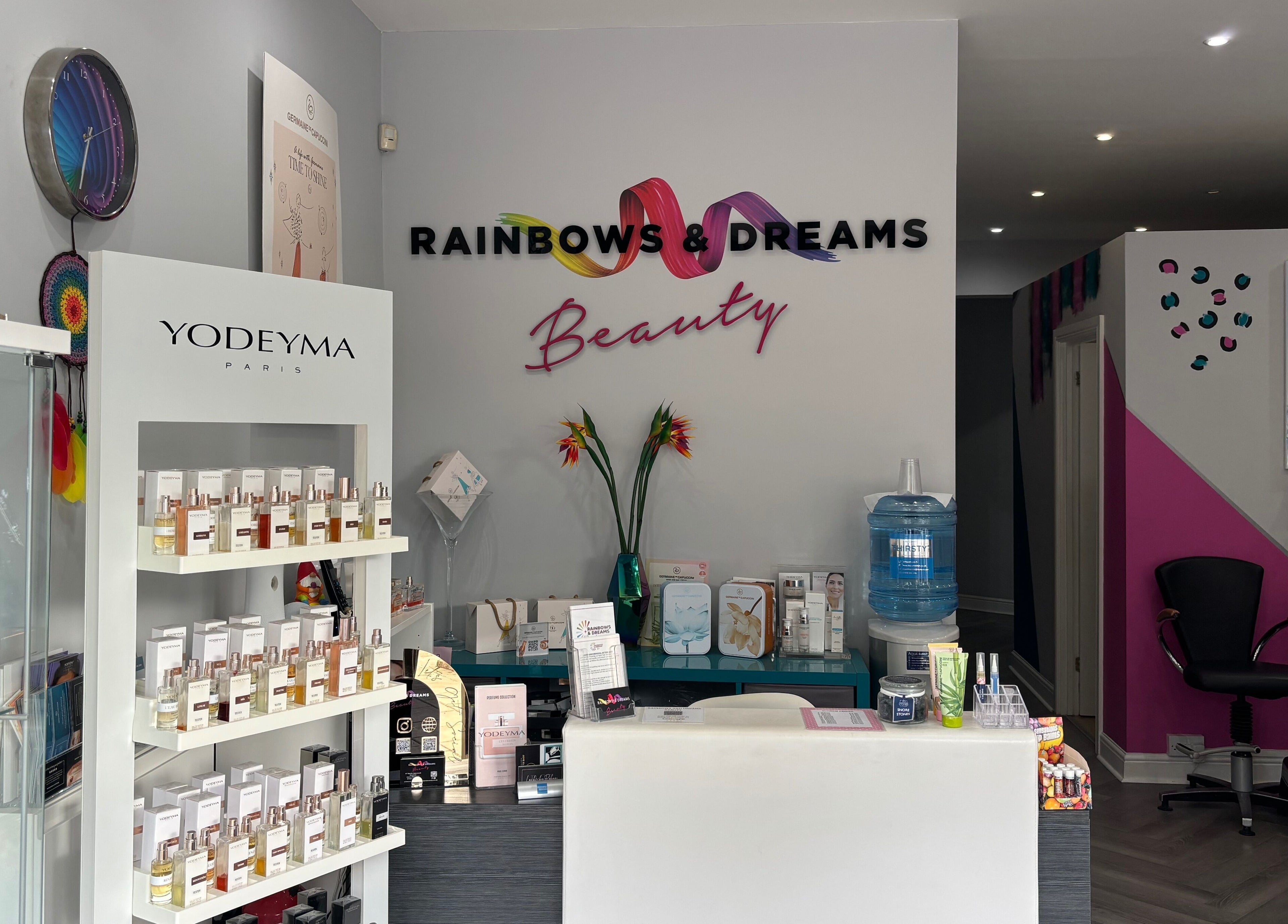 Reception area at Rainbows and Dreams Beauty, Watford, England, GB, with colorful decor and beauty products.