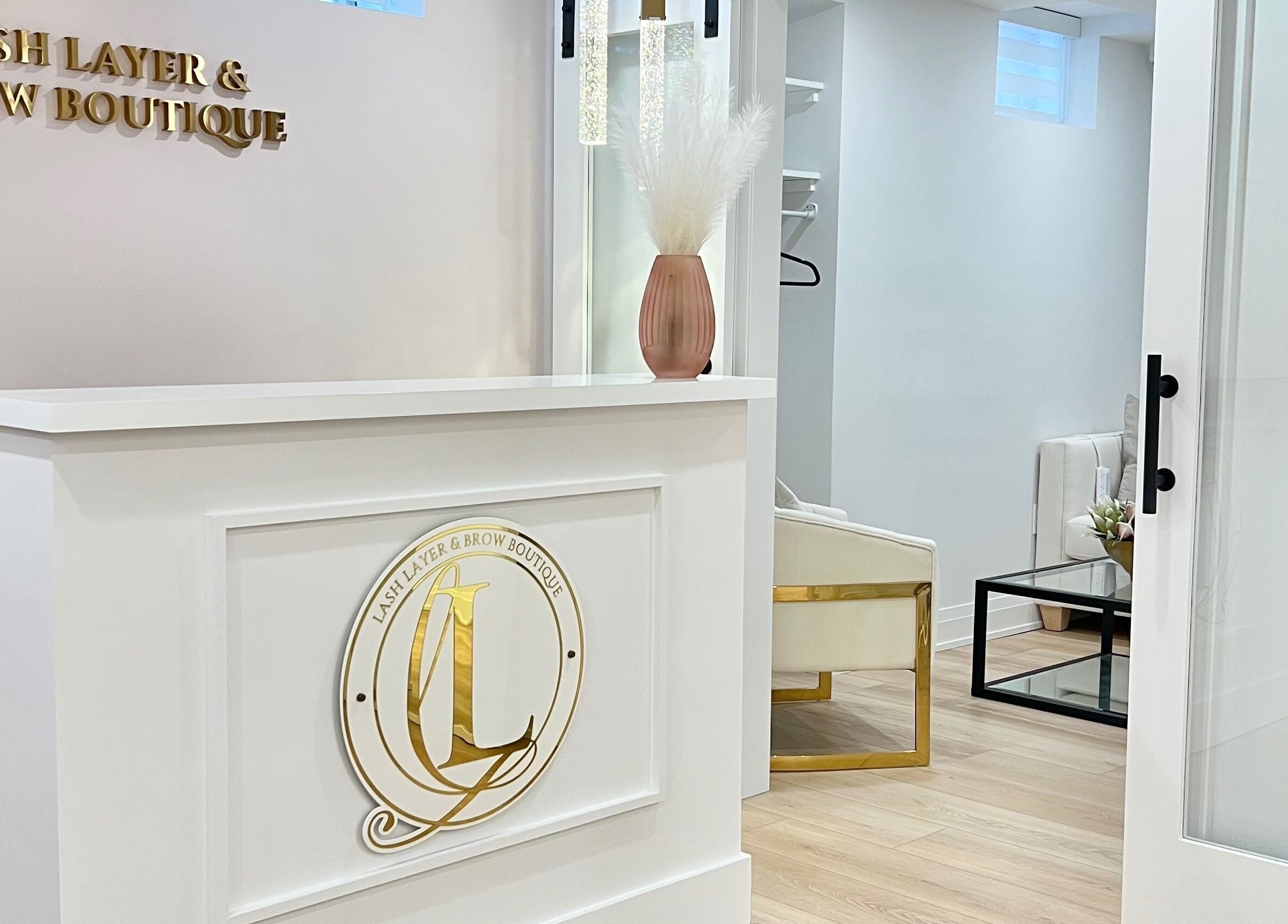 Reception area at Lash Layer and Brow Boutique in Pickering, Ontario, CA with chic decor.